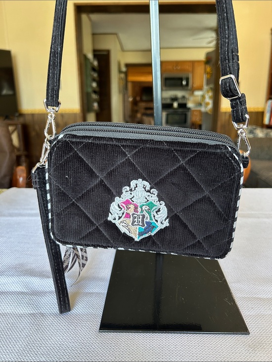 Vera Bradley Handbags - Harry Potter Vera Bradley Black Quilted Crest Crossbody Bag